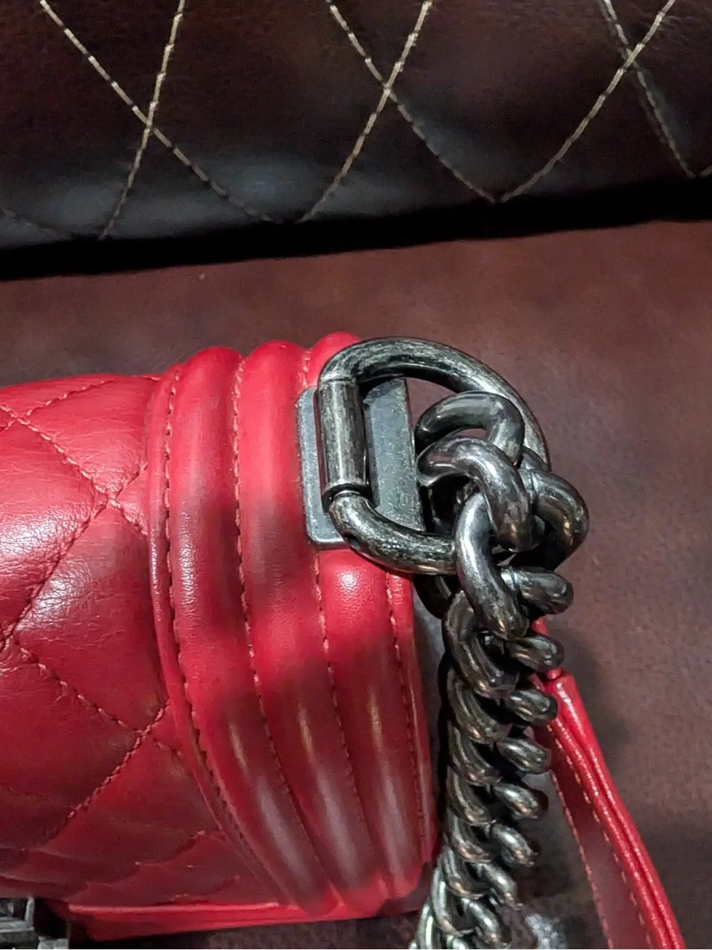 CHANEL Red leather small Boy with gunmetal tone chain
